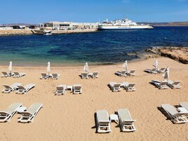 Private beach, sun loungers, beach umbrellas, beach towels
