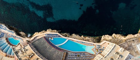 Indoor pool, 3 outdoor pools, pool umbrellas