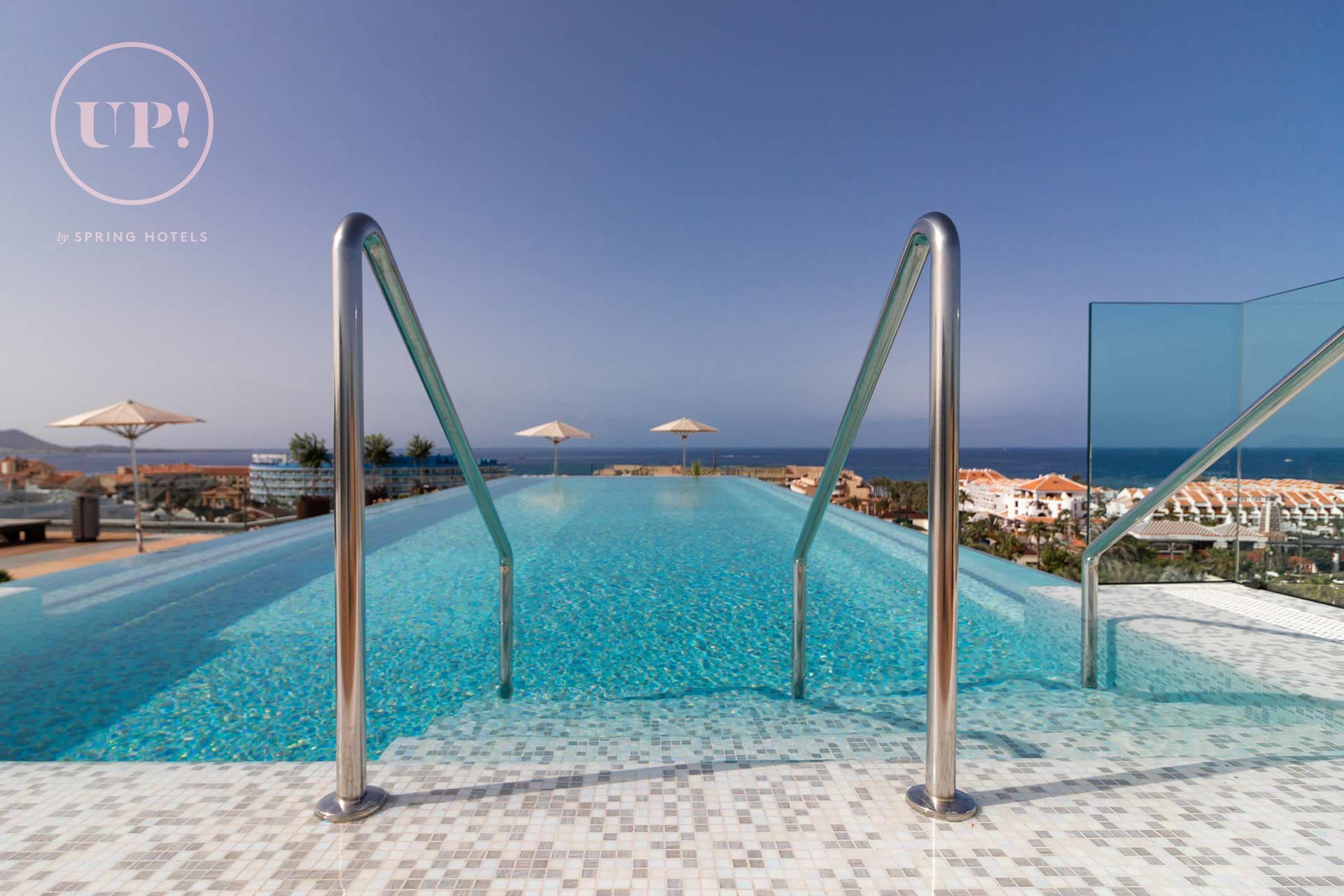 2 outdoor pools, pool umbrellas, pool loungers