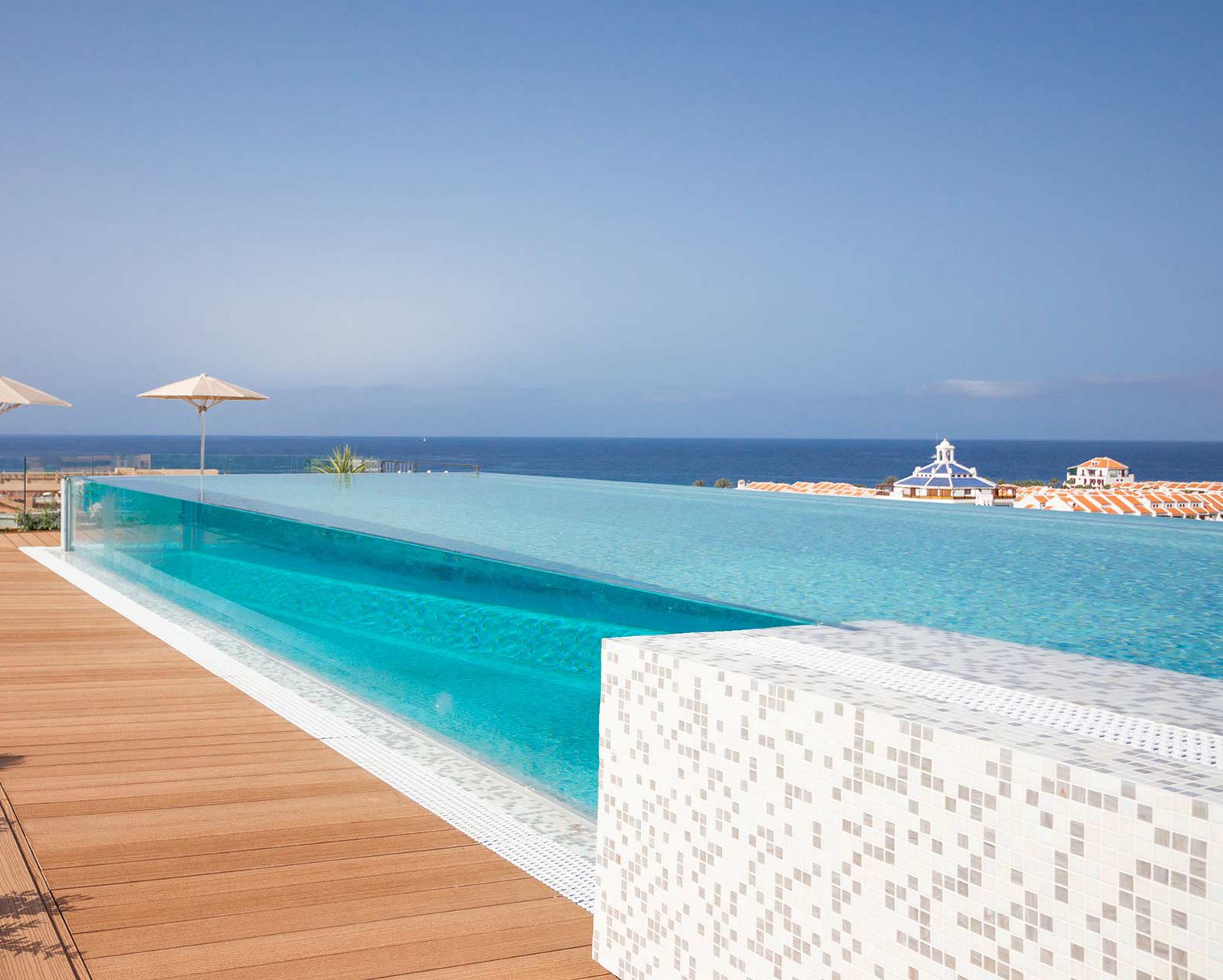 2 outdoor pools, pool umbrellas, pool loungers