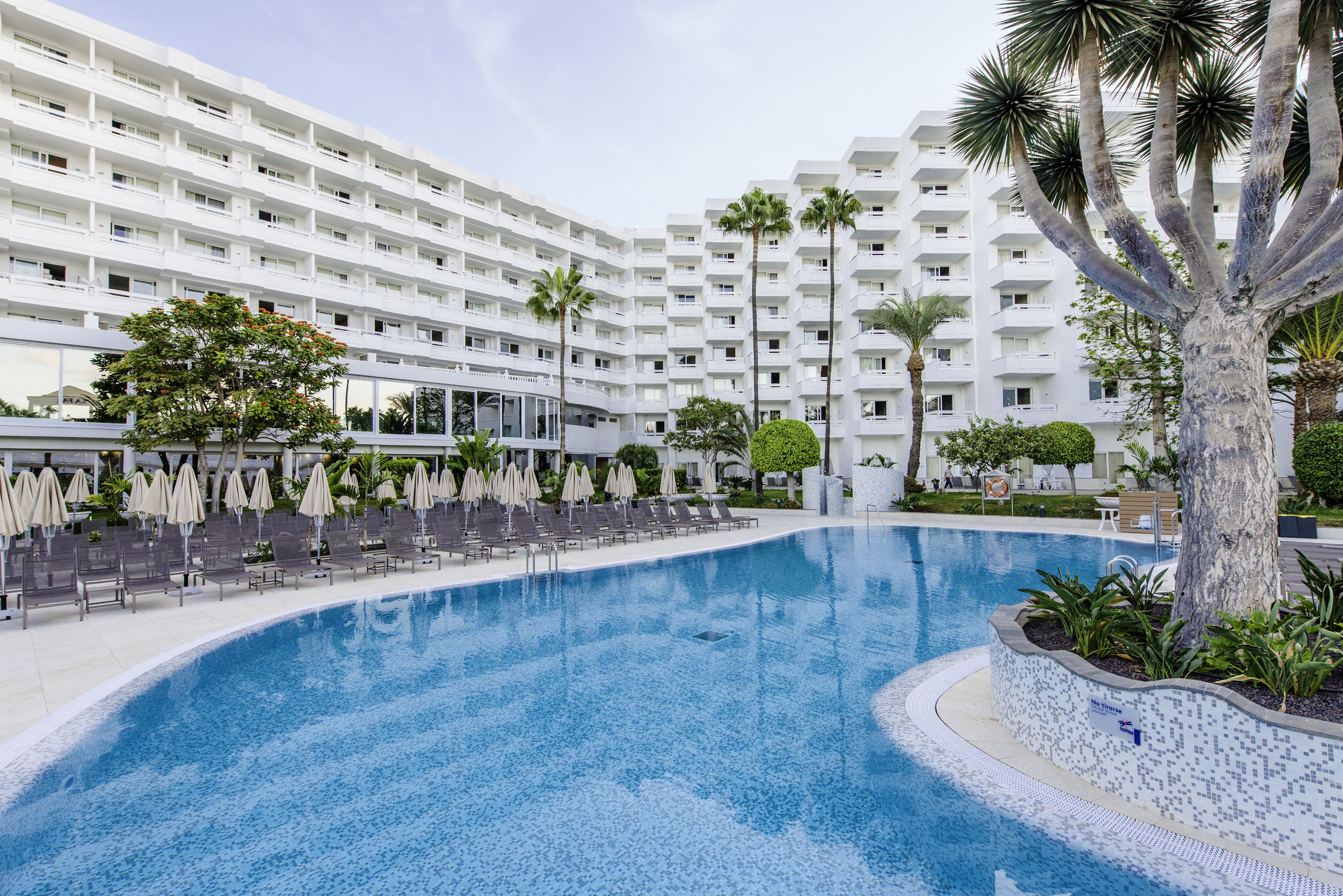 2 outdoor pools, pool umbrellas, sun loungers