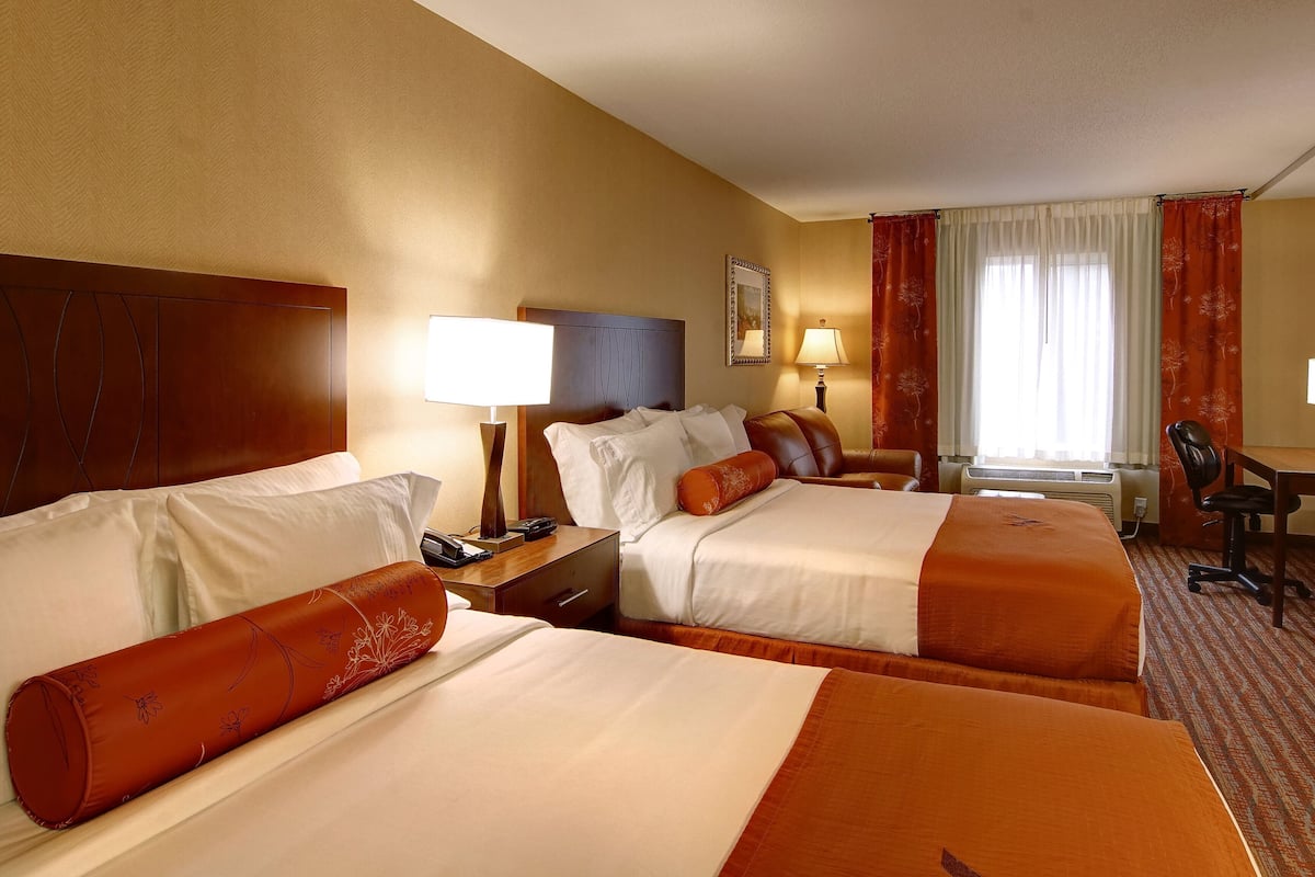 premium bedding, pillow-top beds, desk, blackout curtains