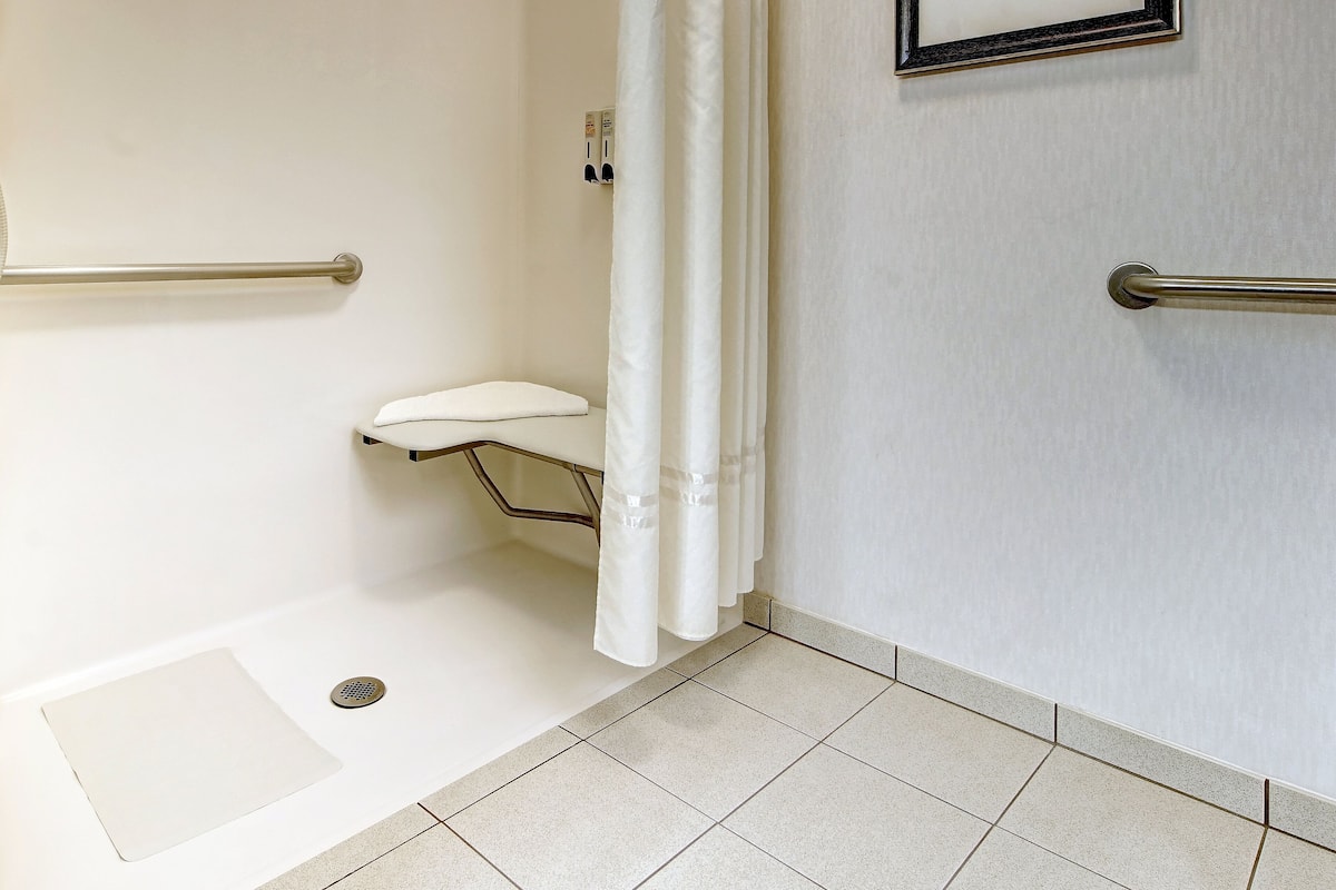 premium bedding, pillow-top beds, desk, blackout curtains