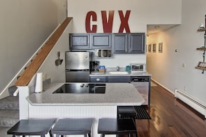 Signature Suite, 2 Bedrooms | Private kitchen | Microwave, coffee/tea maker, cookware/dishes/utensils