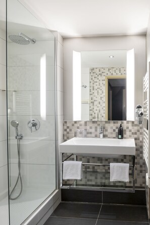 Shower, eco-friendly toiletries, hair dryer, towels