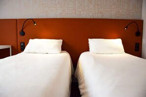 Standardzimmer, 2 Einzelbetten | Hochwertige Bettwaren, Schreibtisch, laptopgeeigneter Arbeitsplatz