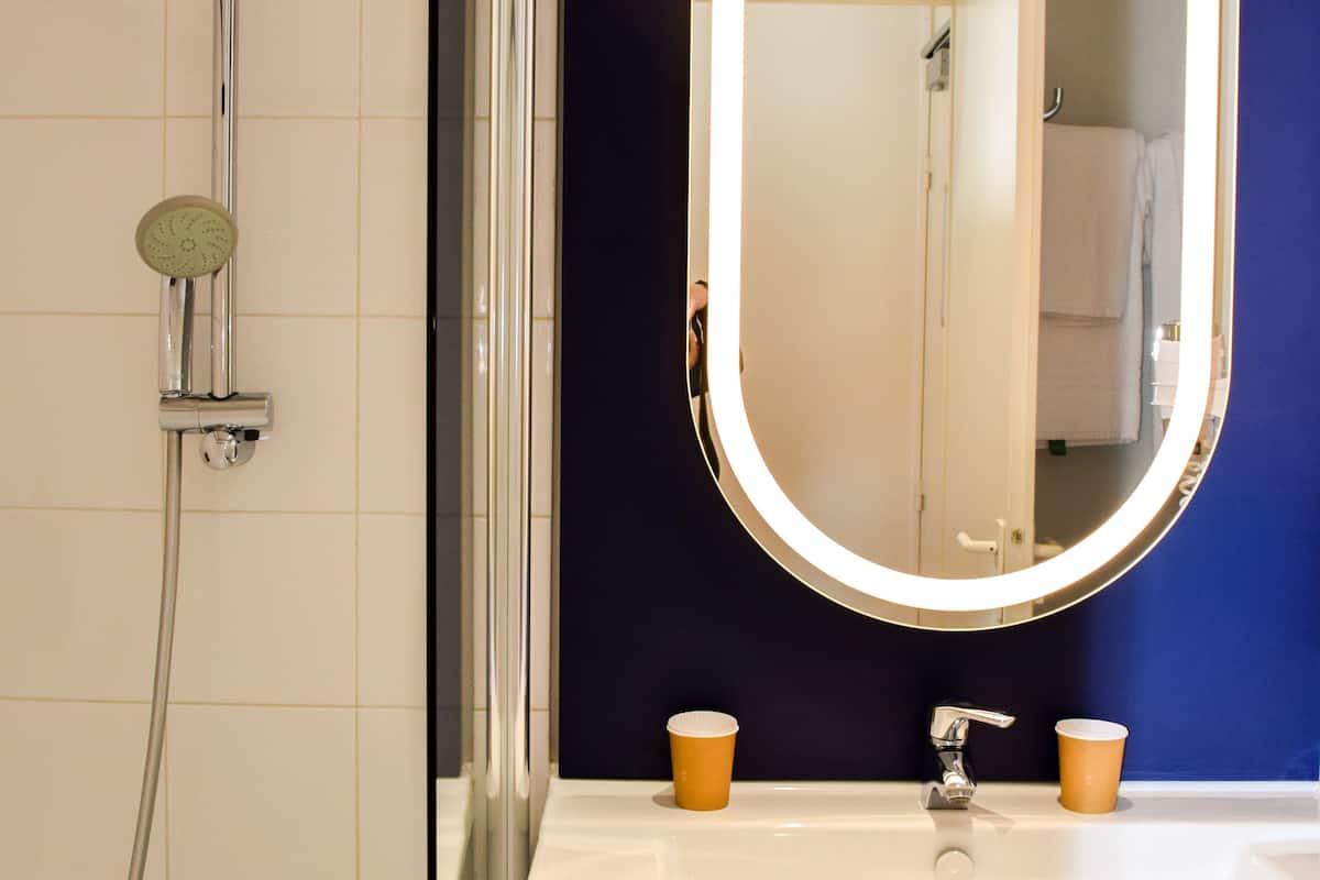 eco-friendly toiletries, hair dryer, towels, soap
