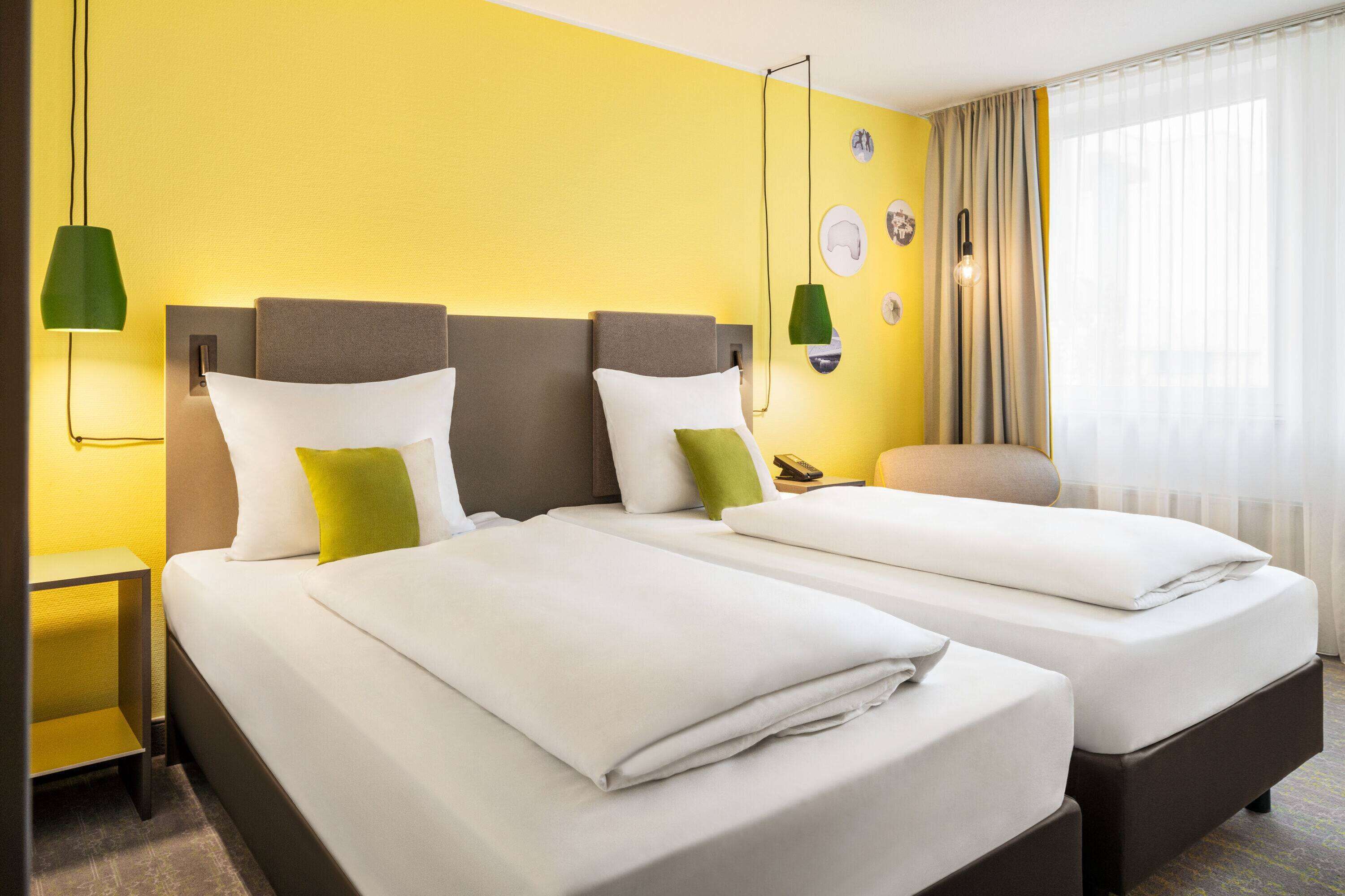 comfort room | hypo-allergenic bedding, desk, blackout curtains, iron/ironing board