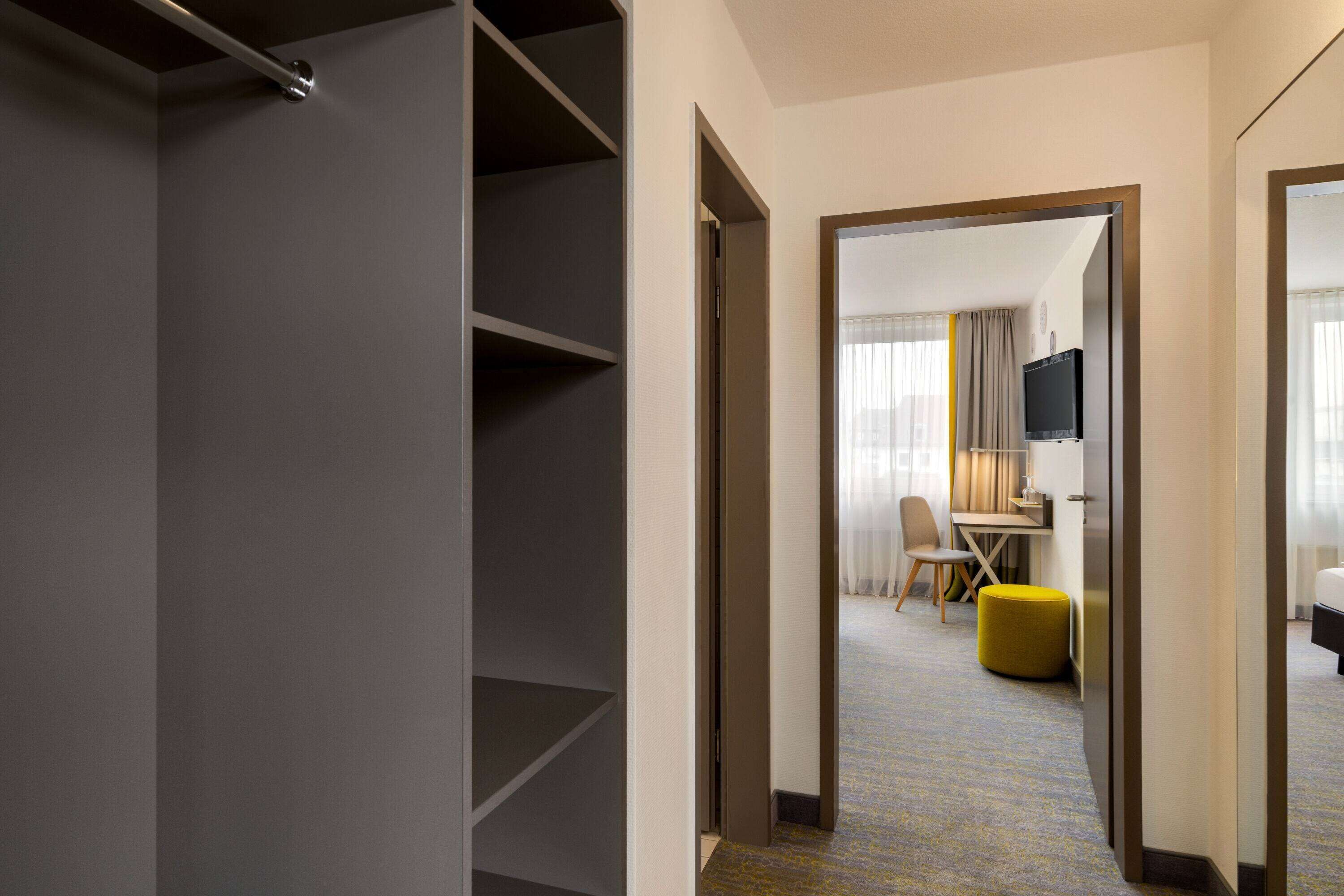 hypo-allergenic bedding, desk, blackout curtains, iron/ironing board