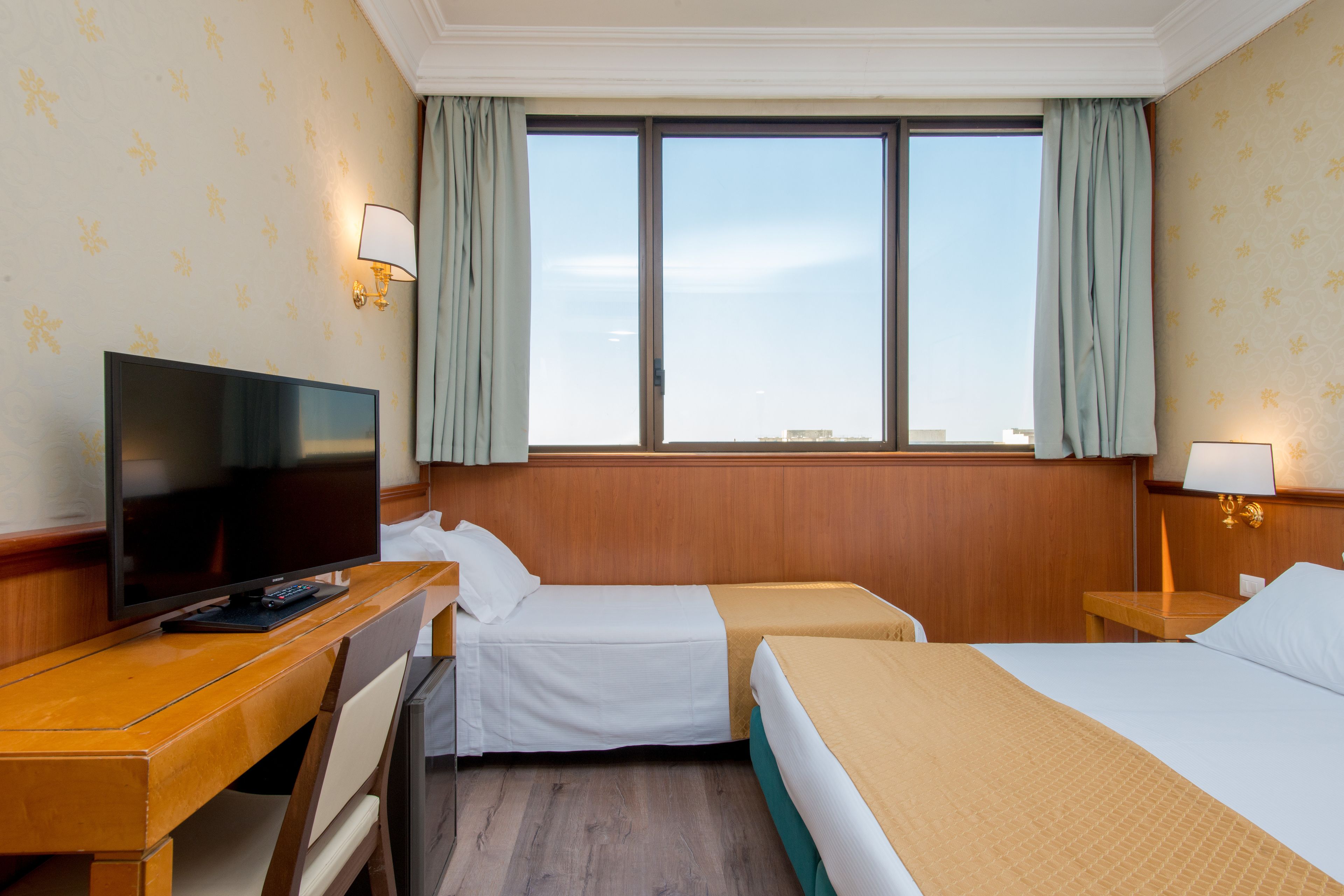 standard triple room | premium bedding, in-room safe, desk, iron/ironing board