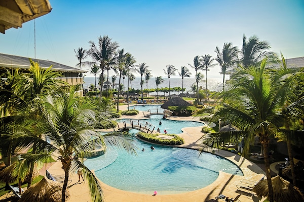 4 outdoor pools, pool umbrellas