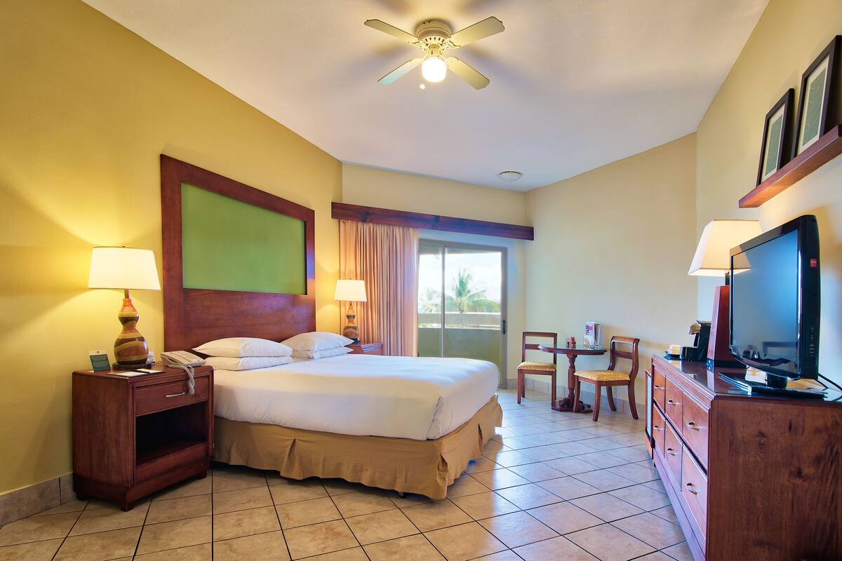 Premium bedding, down comforters, pillowtop beds, in-room safe