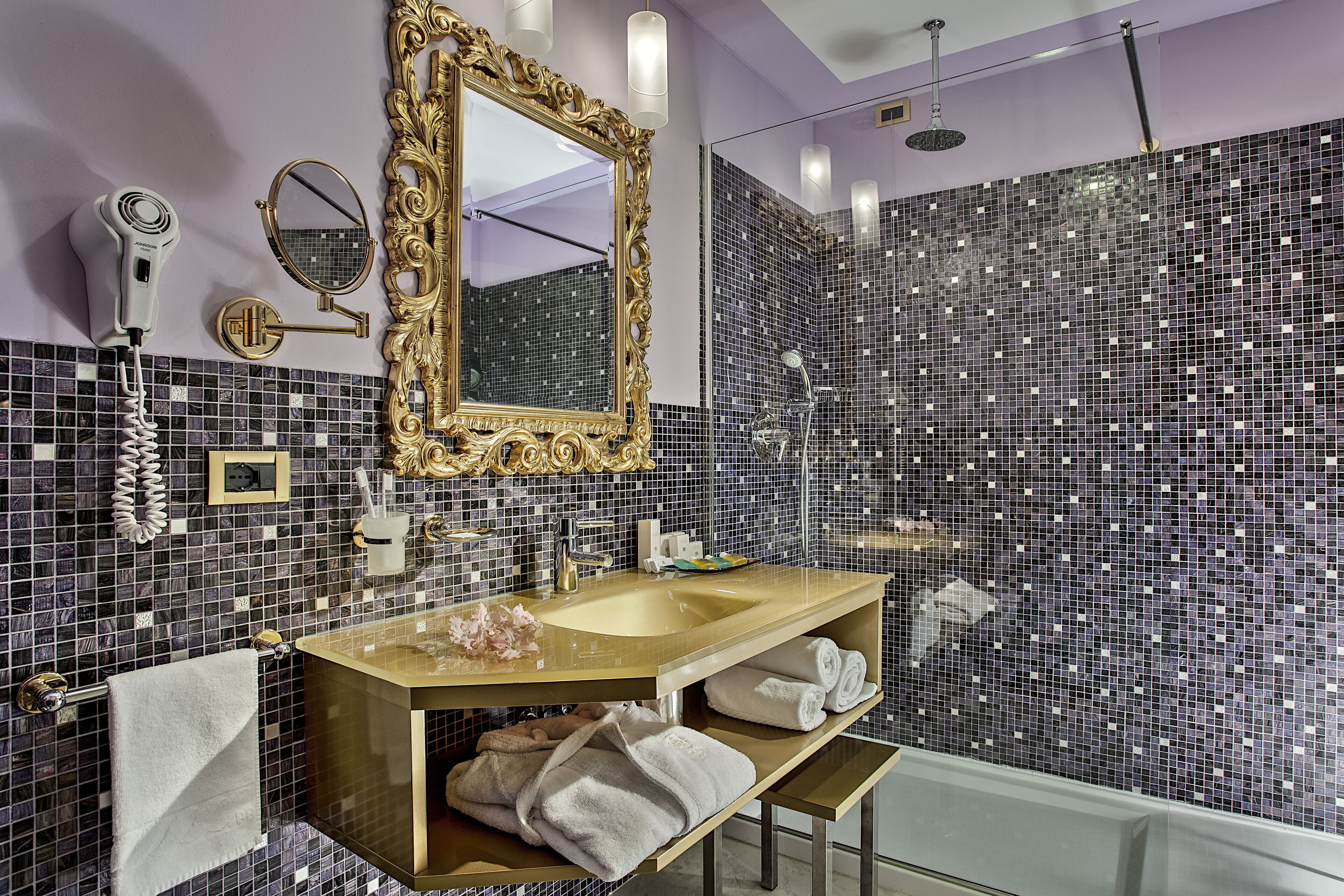 rainfall showerhead, hair dryer, bidet, towels