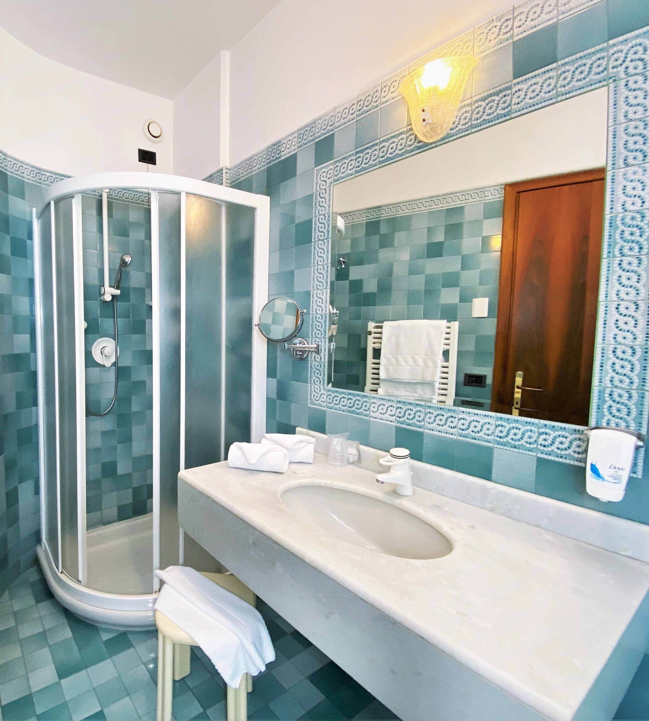 rainfall showerhead, hair dryer, bidet, towels