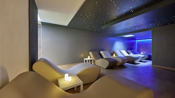 Relax in comfort with contoured lounge chairs and a warm ambiance.
