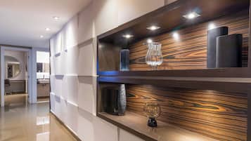 Presidential Studio Suite | Minibar, in-room safe, blackout drapes, iron/ironing board