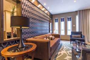 Presidential Studio Suite | Minibar, in-room safe, blackout drapes, iron/ironing board