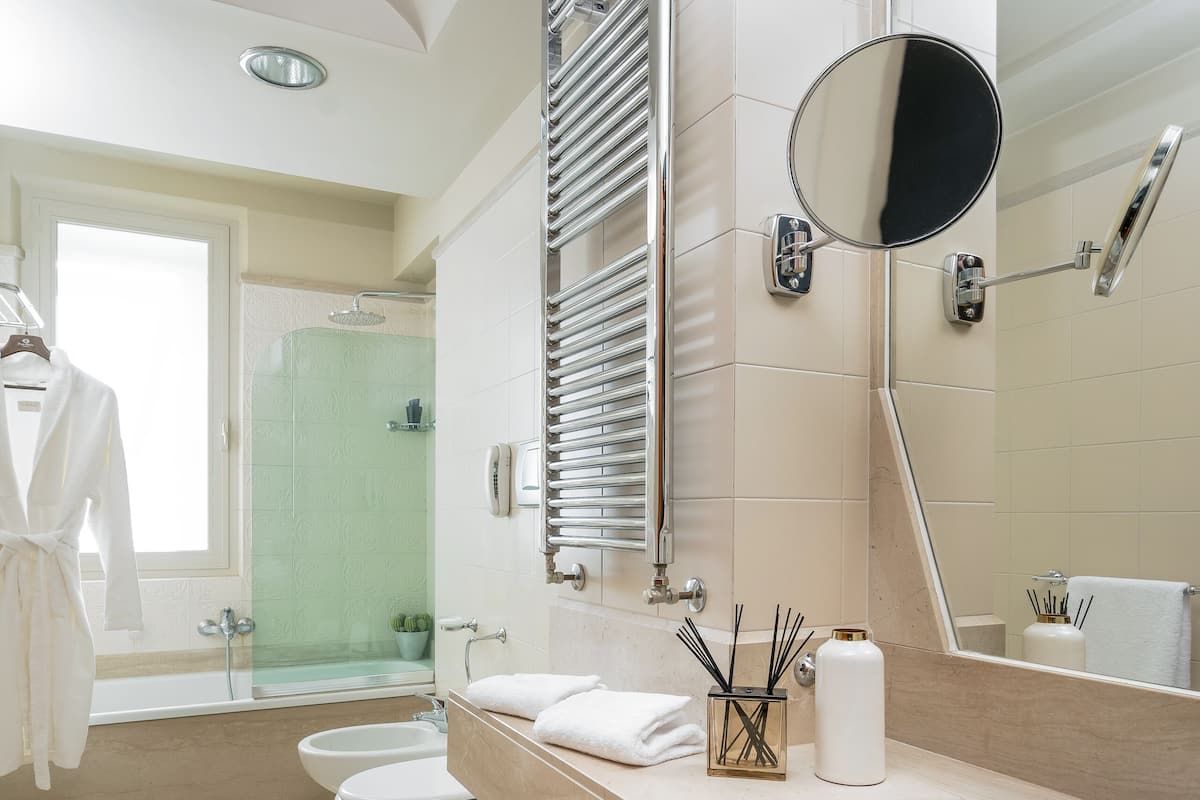 deep-soaking bathtub, free toiletries, hair dryer, bidet