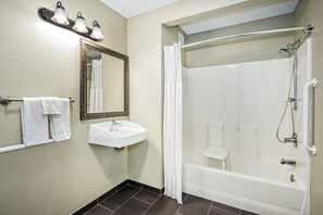 A bathroom with a sink, mirror, and shower. - Staybridge Suites Round Rock by IHG (Round Rock)