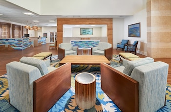 Sitting area in hotel lobby at Hilton Vacation Club Aqua Sol Orlando West