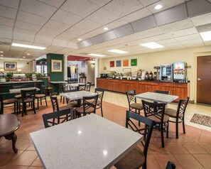 Enjoy a meal at this restaurant with a variety of seating options and a central counter.