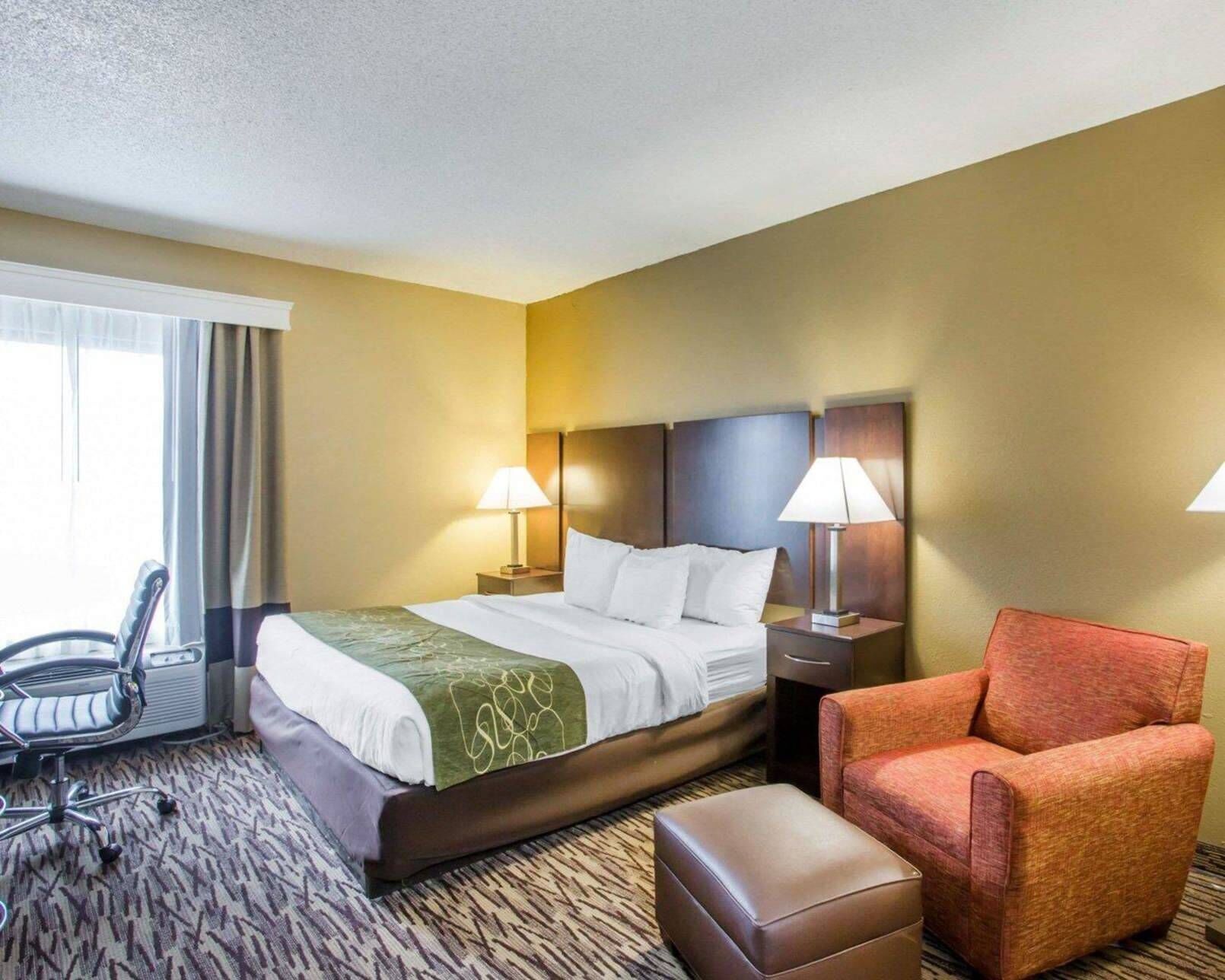 Premium bedding, desk, laptop workspace, iron/ironing board