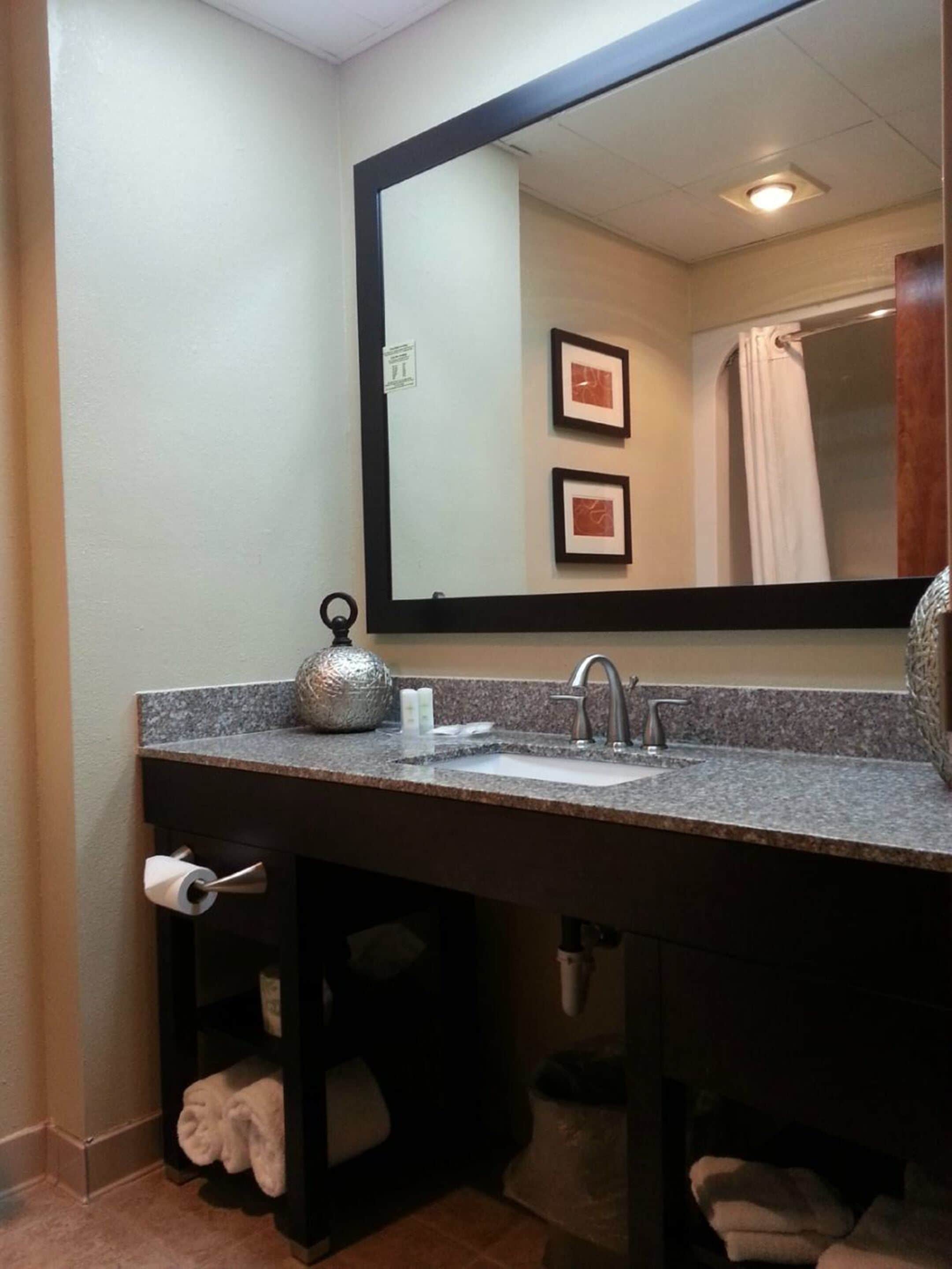 eco-friendly toiletries, hair dryer, towels