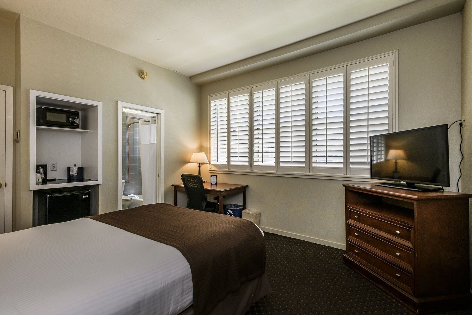 Camas con pillow-top, minibar y escritorio 