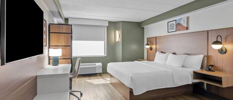 Room, 1 King Bed | Desk, blackout drapes, iron/ironing board, free WiFi