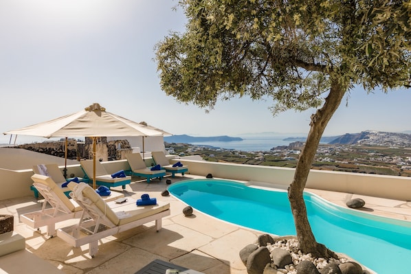 Outdoor pool, pool umbrellas, pool loungers