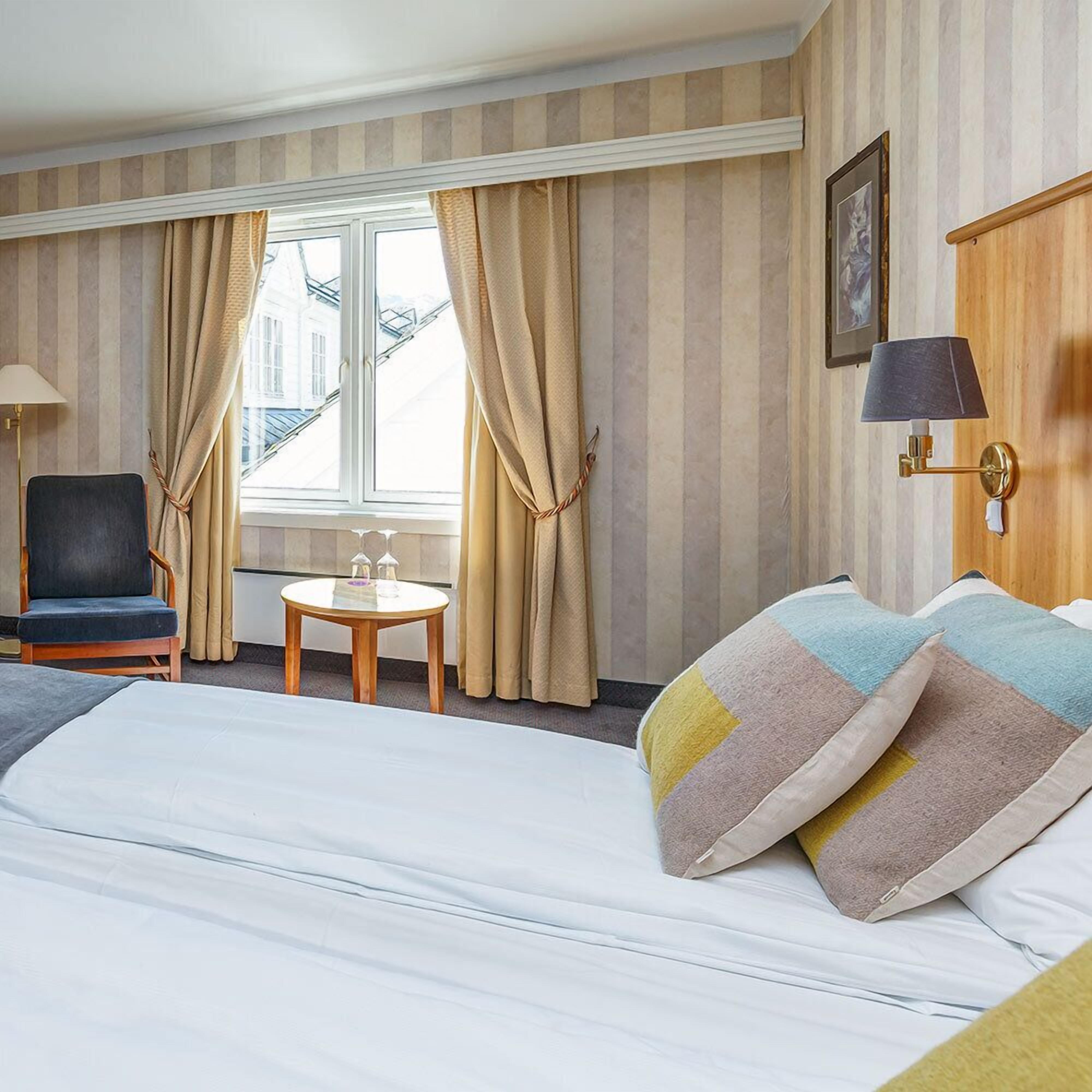 standard double or twin room | pillow-top beds, desk, iron/ironing board, cots/infant beds