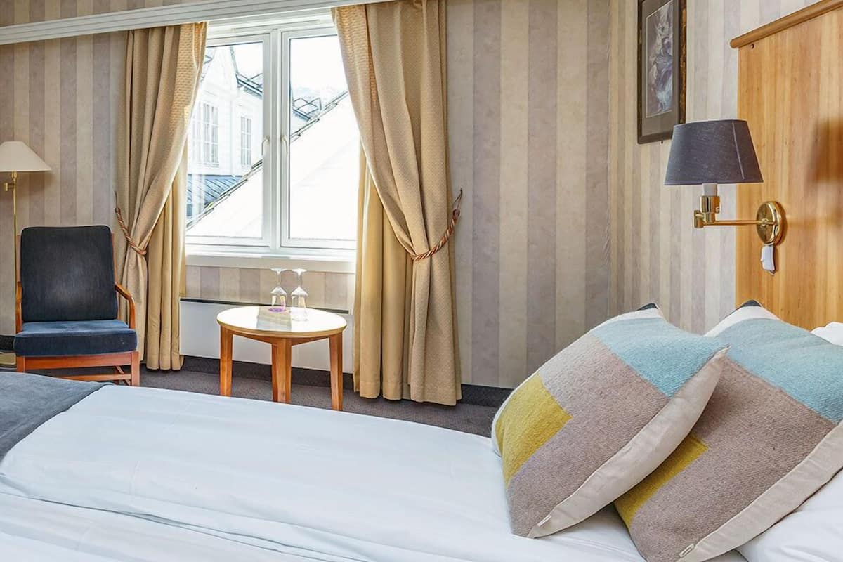 standard double or twin room | pillow-top beds, desk, iron/ironing board, cots/infant beds