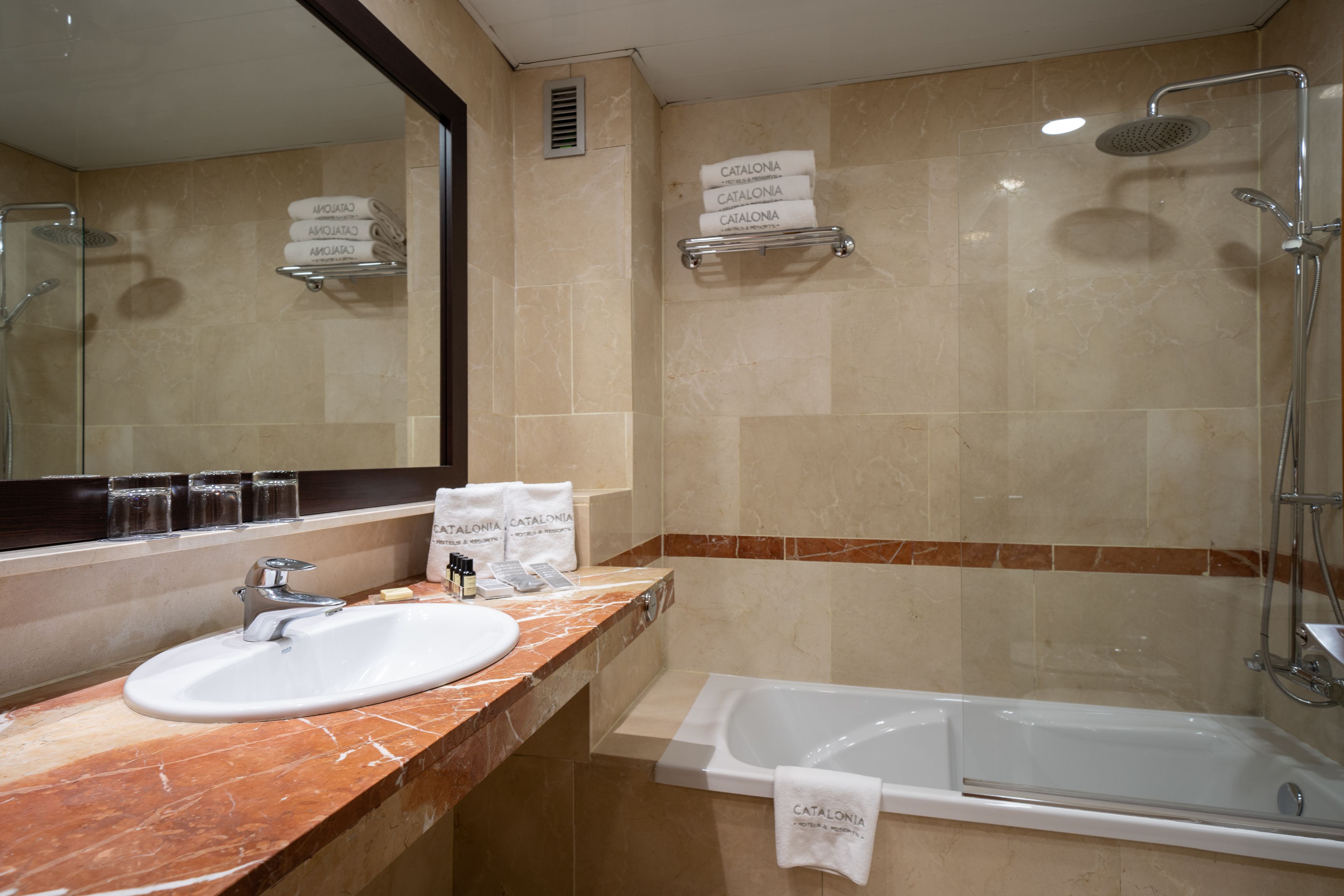 eco-friendly toiletries, towels, soap, shampoo