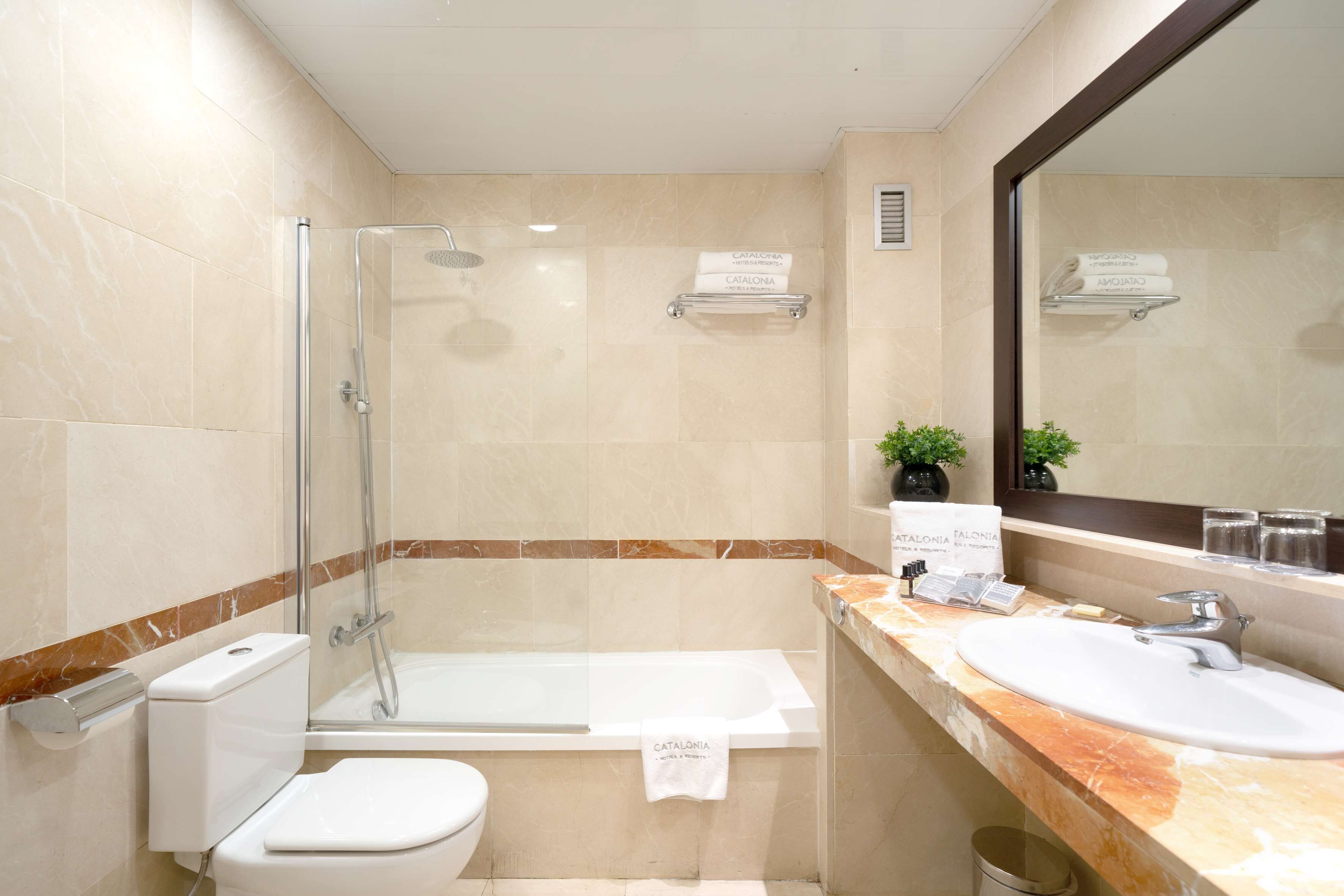 eco-friendly toiletries, towels, soap, shampoo