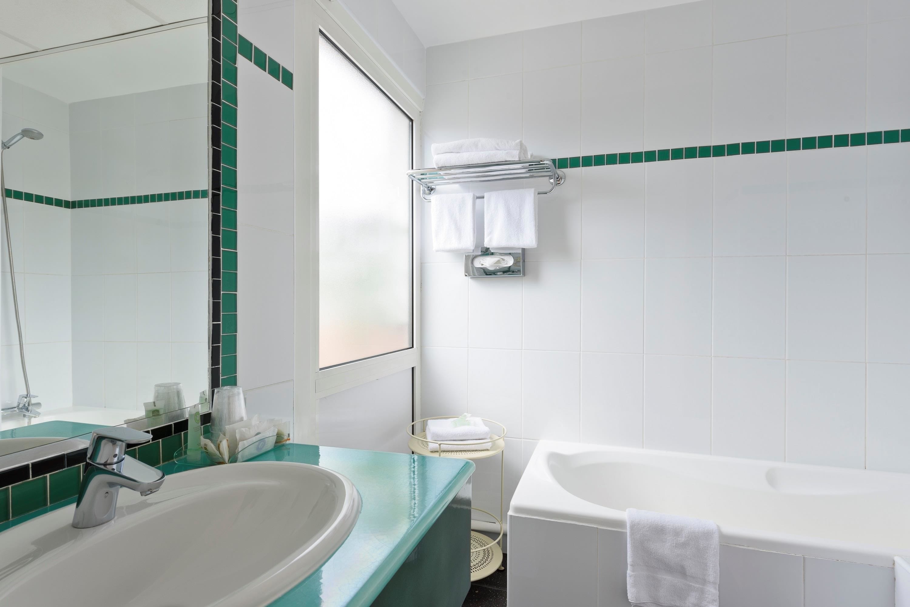 combined shower/bathtub, free toiletries, hair dryer, towels