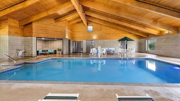 Indoor pool, open 8:00 AM to 10:00 PM, pool loungers