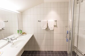 Shower, free toiletries, hair dryer, towels