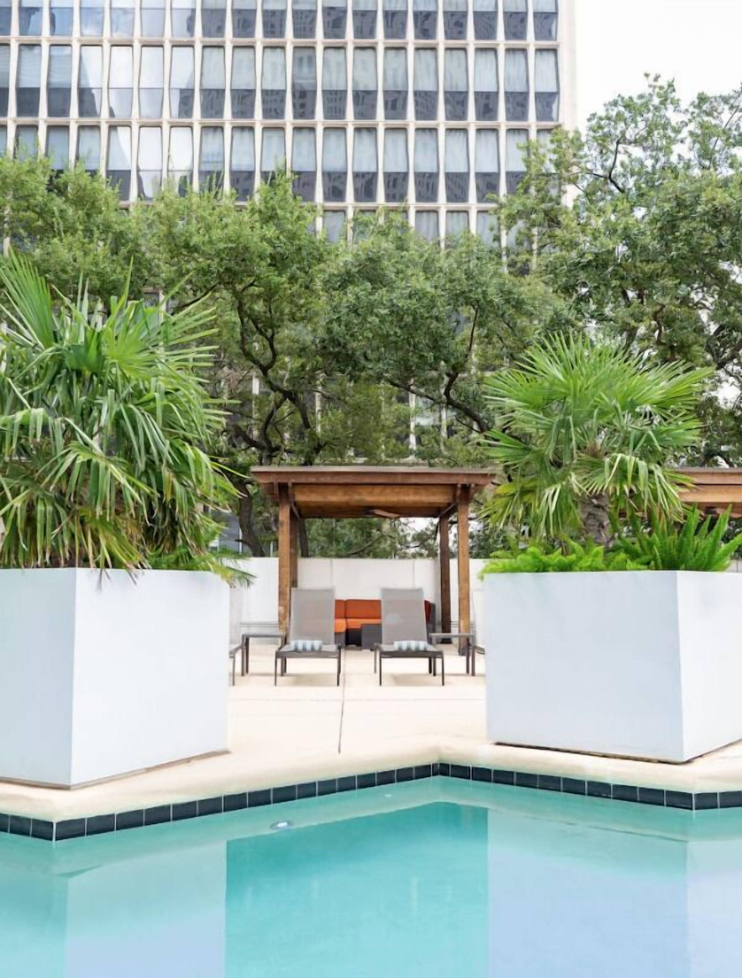 Outdoor pool, pool umbrellas, pool loungers