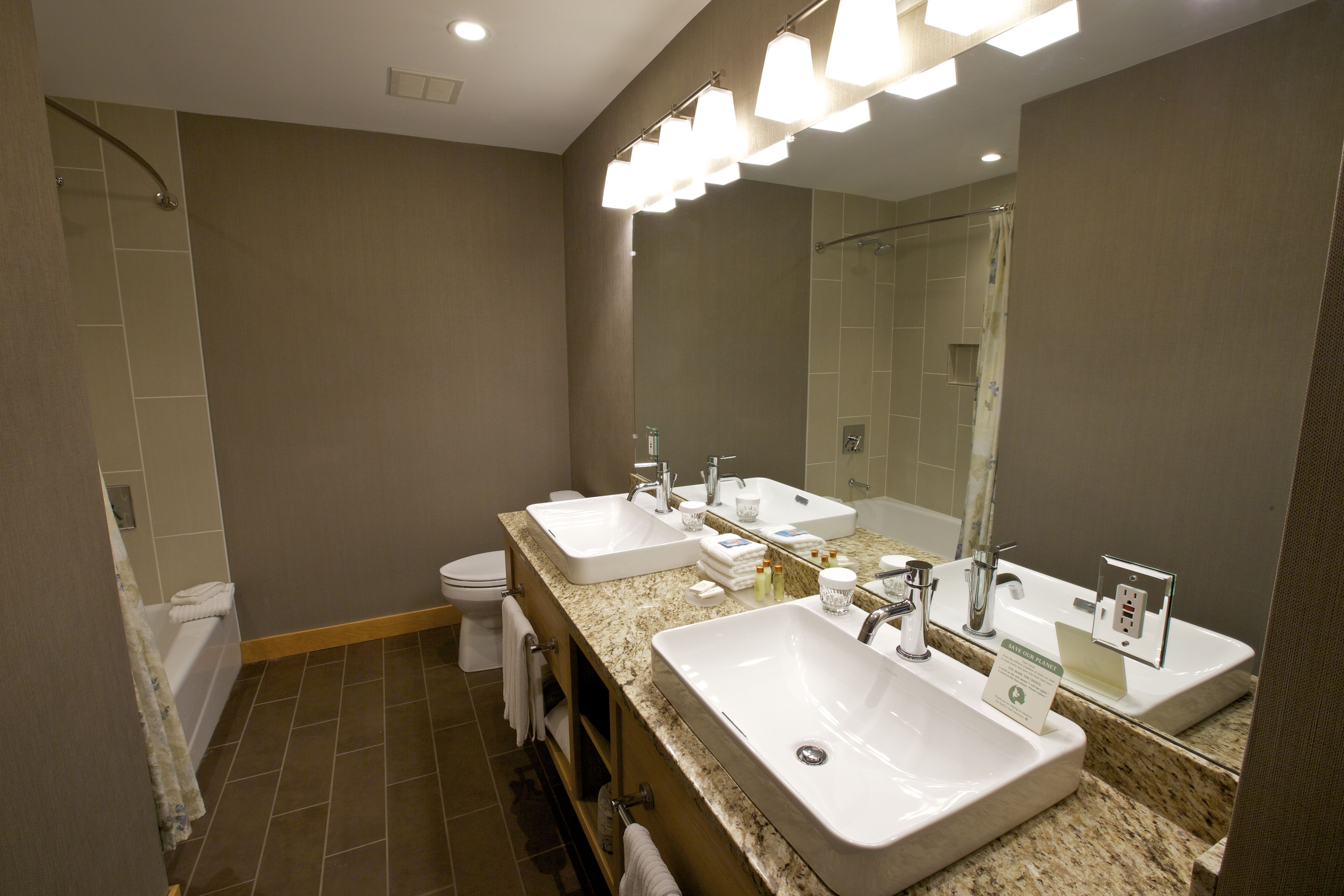 combined shower/bathtub, hair dryer, bathrobes, towels