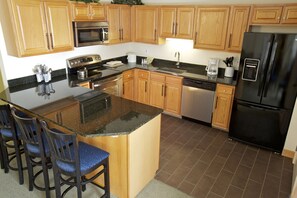 Suite, 1 Bedroom | Private kitchen | Coffee/tea maker