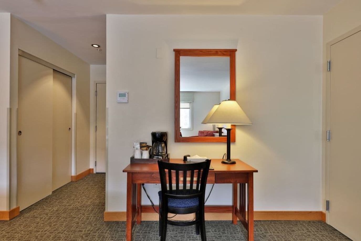 hotel room, 2 queen beds | desk, blackout curtains, iron/ironing board, free wifi