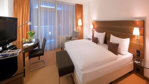 Hypo-allergenic bedding, down duvets, minibar, in-room safe