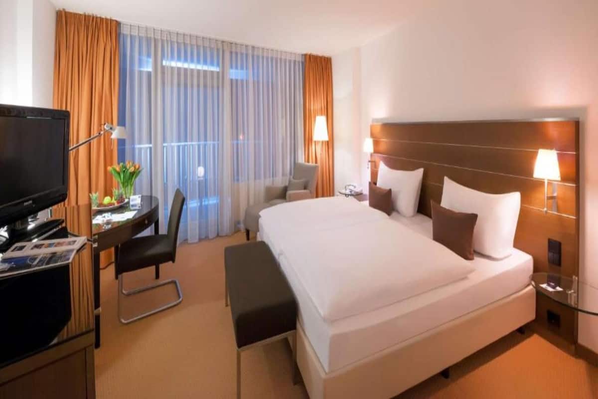Hypo-allergenic bedding, down duvets, minibar, in-room safe