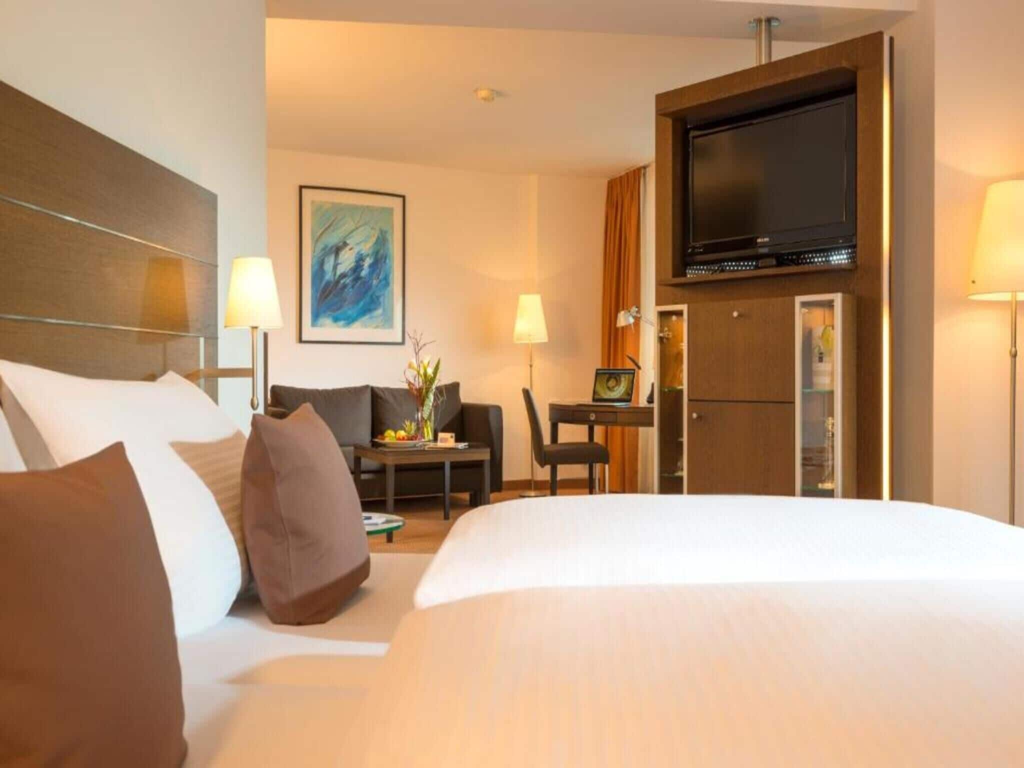 Hypo-allergenic bedding available, down comforters, minibar