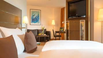 Hypo-allergenic bedding available, down comforters, minibar
