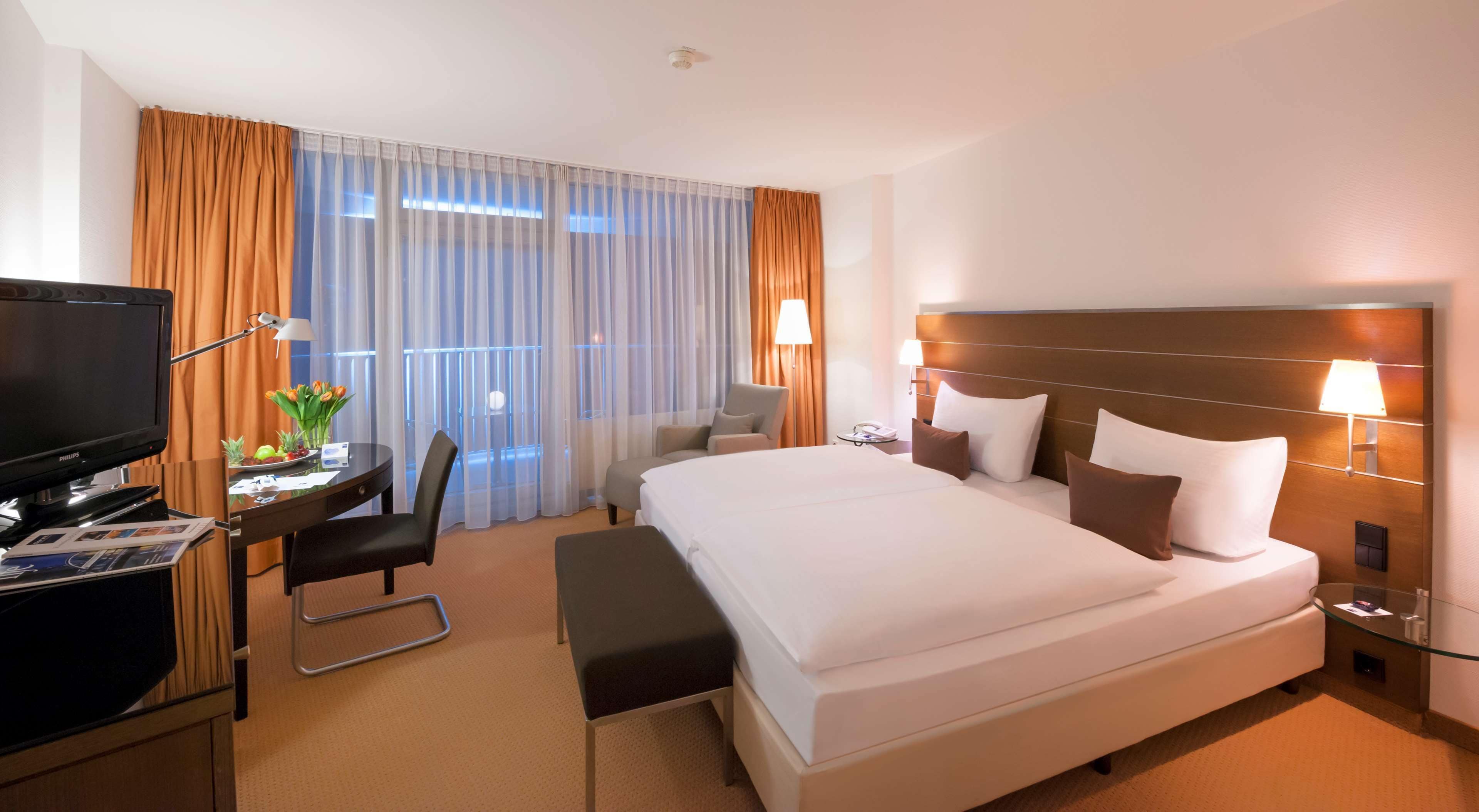 hypo-allergenic bedding, down duvets, minibar, in-room safe