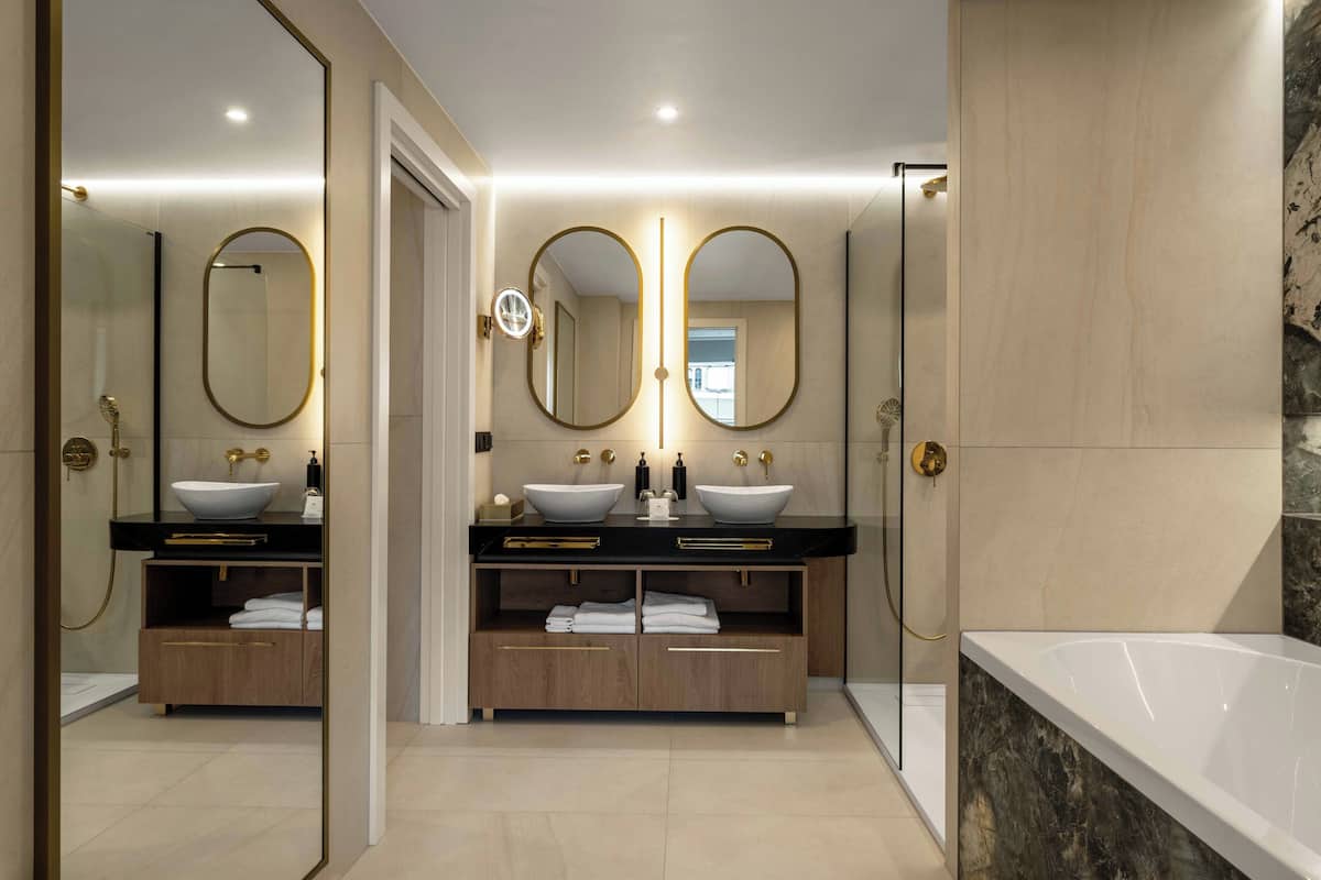 presidential suite, 1 king bed | bathroom | free toiletries, hair dryer, slippers, towels