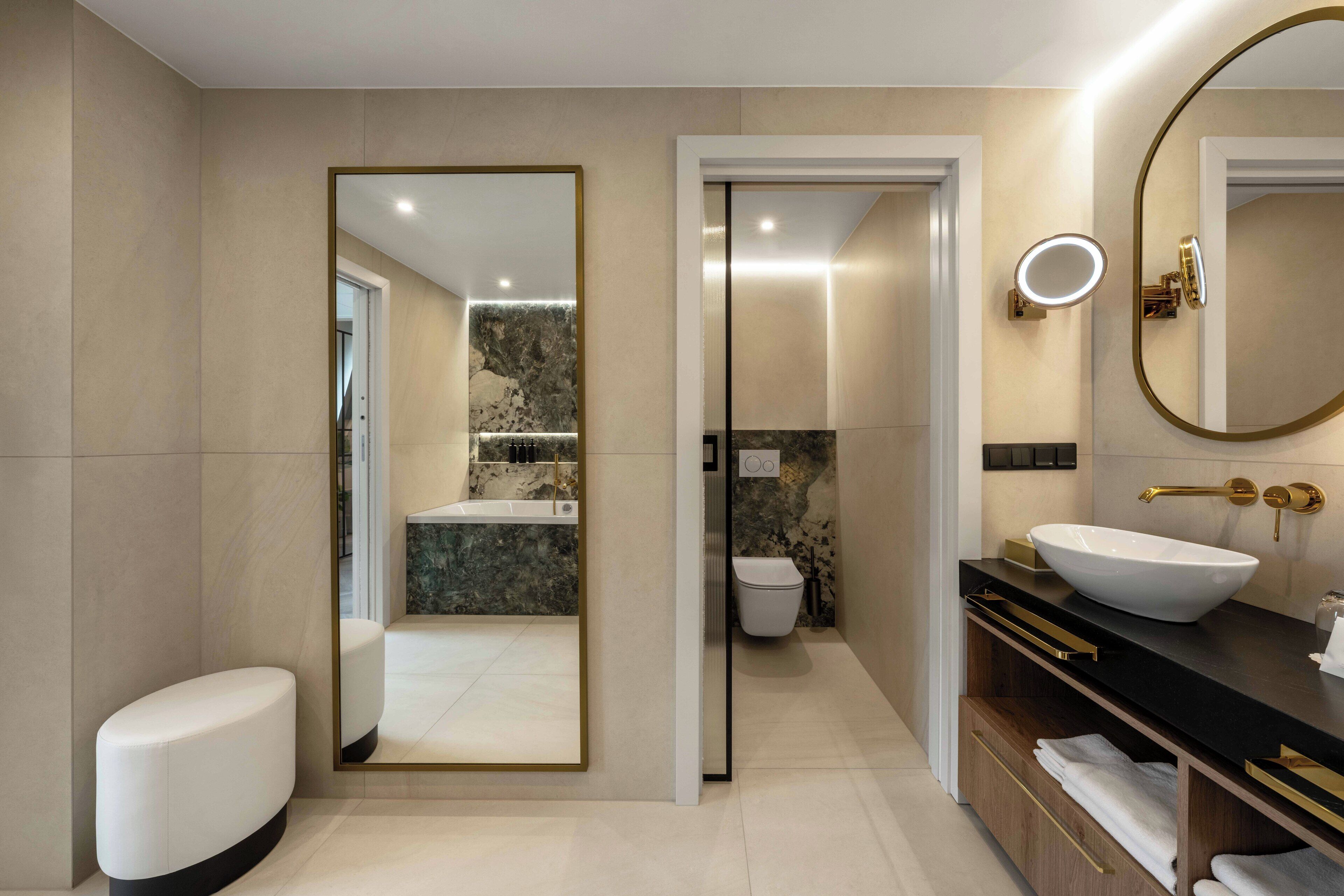 presidential suite, 1 king bed | bathroom | free toiletries, hair dryer, slippers, towels