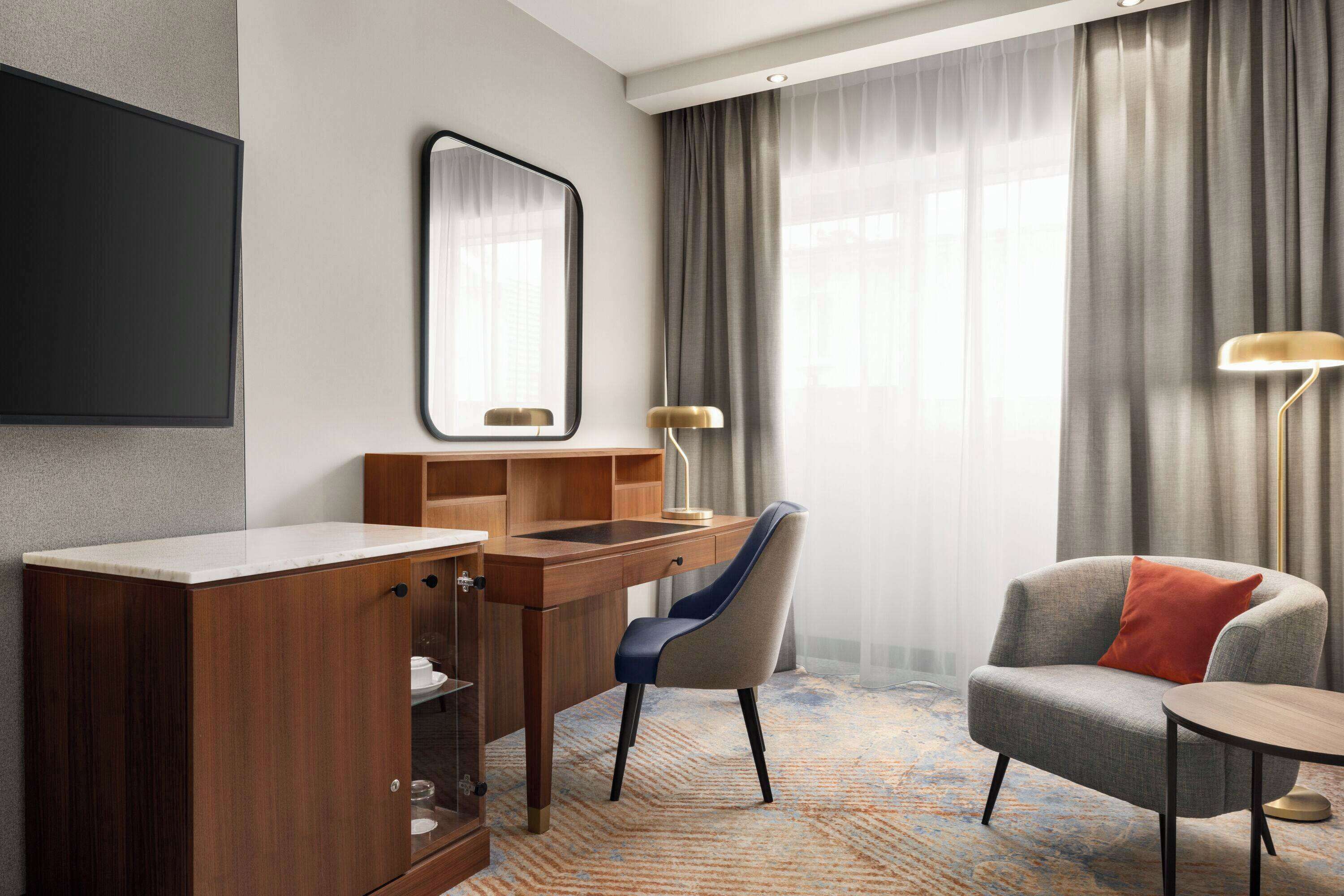 classic room, 1 queen bed | in-room safe, desk, laptop workspace, soundproofing