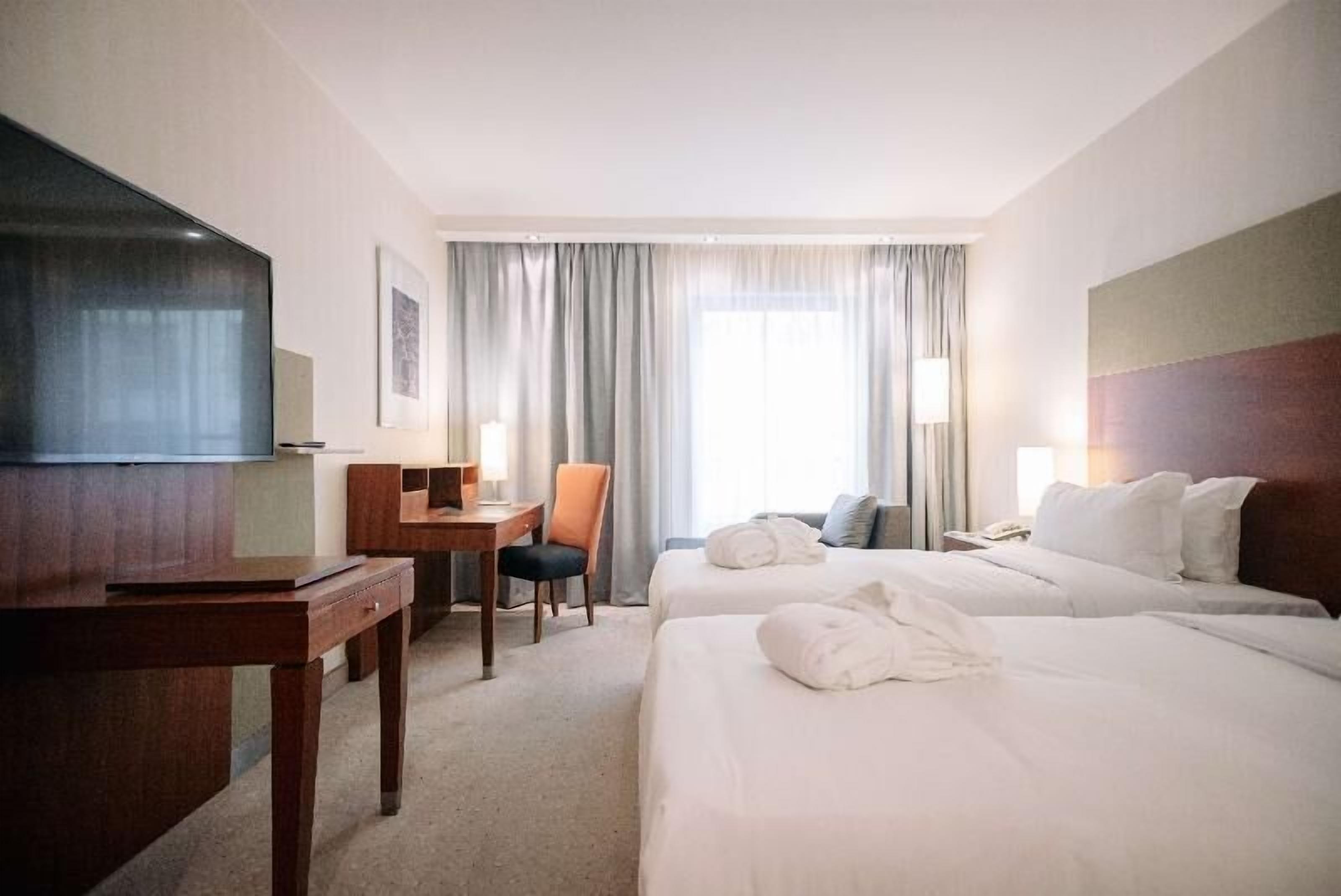 In-room safe, desk, laptop workspace, iron/ironing board